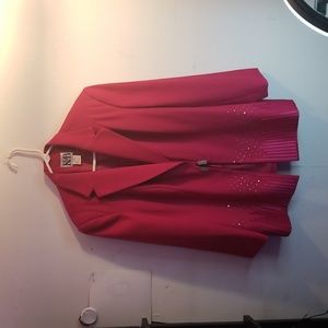 Suit size ex large color fuschia. Studded jacket with studded attached vest